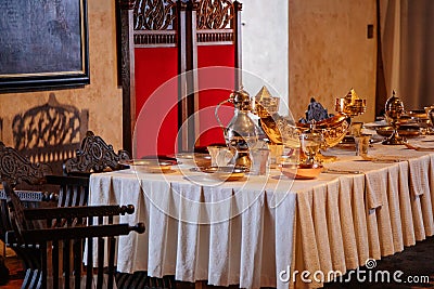 Karlstejn, Czech Republic, 12 March 2022: medieval gothic castle interior, antique wood carved furniture, dining room or grand Editorial Stock Photo