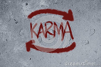 karma graffiti on the wall Stock Photo