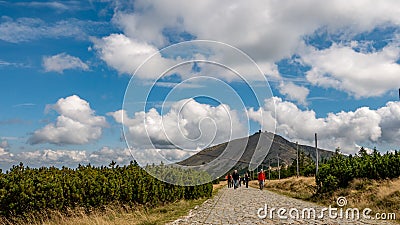 Tourists on the trail in the Karkonosze Mountains, Sniezka summit 1603 m n.p.m., Karkonosze National Editorial Stock Photo
