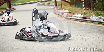 Karting. motorsport road racing with open-wheel four wheeled vehicles at go-karts Stock Photo