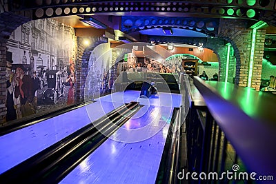 Kartuzy, Poland - November 22, 2017: Bowling alley with neon lights in the hotel building Editorial Stock Photo