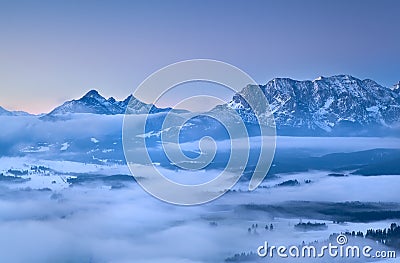 Karwendel mountains in morning fog Stock Photo