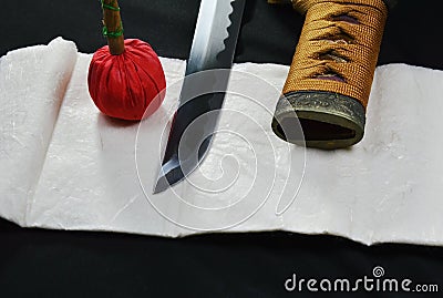 Katana Japanese sword blade and scabbard with red compress Stock Photo