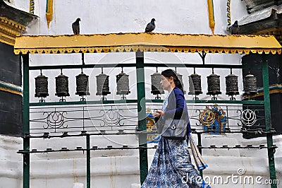 Praying at Kathesimbhu Stupa Editorial Stock Photo