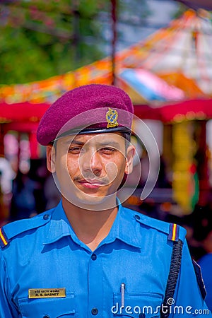 KATHMANDU, NEPAL - SEPTEMBER 04, 2017: Portrait of a Guard from the Nepalese Army posing for camera at the enter of Editorial Stock Photo