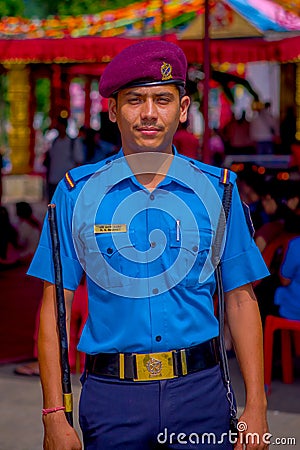 KATHMANDU, NEPAL - SEPTEMBER 04, 2017: Portrait of a Guard from the Nepalese Army posing for camera at the enter of Editorial Stock Photo