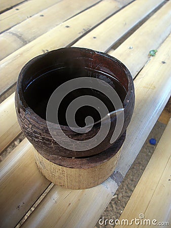 Kawa Daun Served in a Coconut Shell Cup Stock Photo