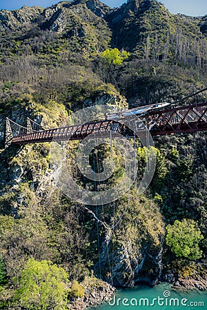 Kawarau Bridge, New Zealand, October 6, 2019: Modern European boy bungee jumping at A.J. Hackett Stock Photo