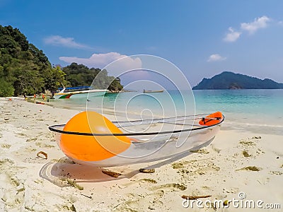 Kawthoung Province,Myanmar on April 6,2018:Transparent kayak for tourists on white sand beach of Flower Island Editorial Stock Photo