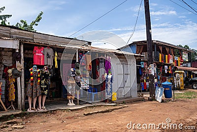 Market stalls selling clothing, hats, paintings, jewelry and other souviners at the equator line Editorial Stock Photo