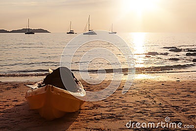 Kayak boat on sandy beach Stock Photo