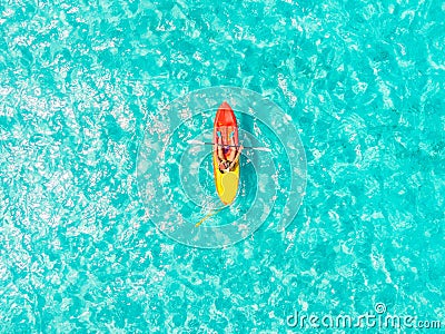 Kayak boat turquoise blue water sea, sunny day. Concept travel. Aerial top view Stock Photo