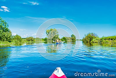 Kayak trip on blue river landscape Stock Photo