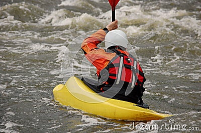 Kayaker training on a rough water. Stock Photo