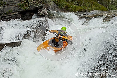 Kayaker in the waterfall Stock Photo