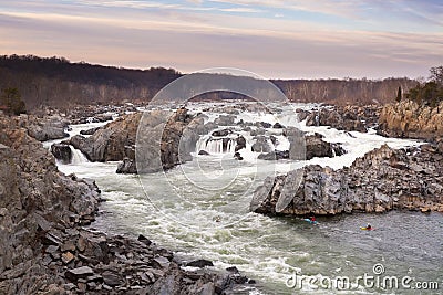 Kayakers navigating whitewater rapids at Great Falls Park, VA Editorial Stock Photo