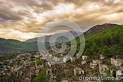 Kayakoy houses in historcial Lycian village of Kayakoy, Fethiye, Mugla, Turkey. Ghost Town KayakÃ¶y, anciently known as Lebessos Stock Photo