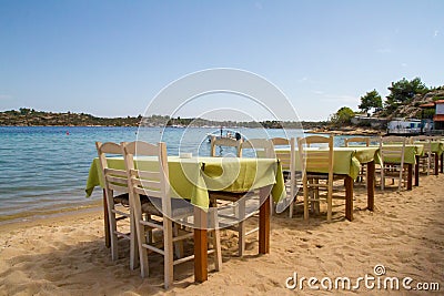 Kayaks arranged on the beach in Greece. Stock Photo