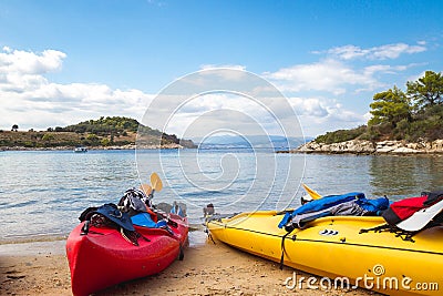 Kayaks arranged on the beach in Greece. Stock Photo