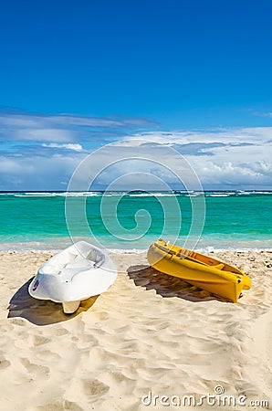 Kayaks on the beautiful sandy Caribbean beach Stock Photo