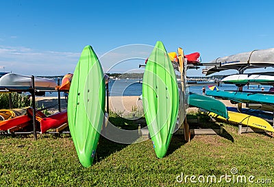 Kayaks and canoes on the Beach in Oyster Bay, New York Editorial Stock Photo