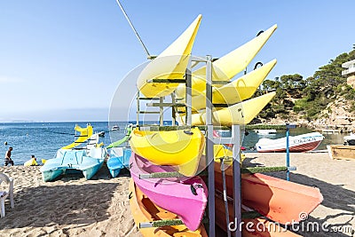 Kayaks, canoes and pedalos with slides Editorial Stock Photo