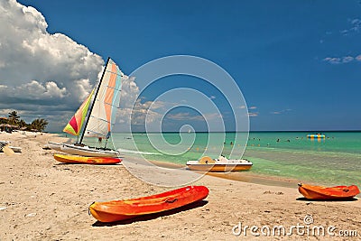 Kayaks and catamarans at the beautiful beach Stock Photo