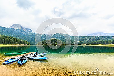 Kayaks docked on the shore of Black Lake, Durmitor National Park, Zabljak, Montenegro. Stock Photo
