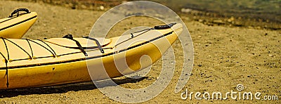 Kayaks on water shore Stock Photo
