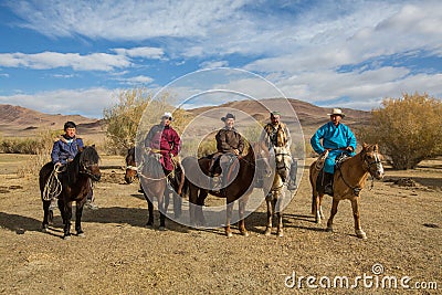 Kazakh Eagle hunters on horseback. In Bayan-Olgii Province is populated to 88,7% by Kazakhs. Editorial Stock Photo