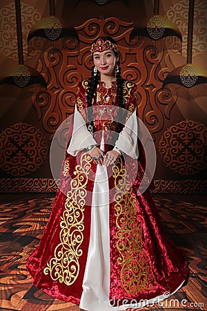 Kazakh national wedding dress. Ornaments and embroidery on fabric. Stock Photo