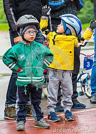 KAZAKHSTAN, ALMATY - JUNE 11, 2017: Children`s cycling competitions Tour de kids. Children aged 2 to 7 years compete in Editorial Stock Photo