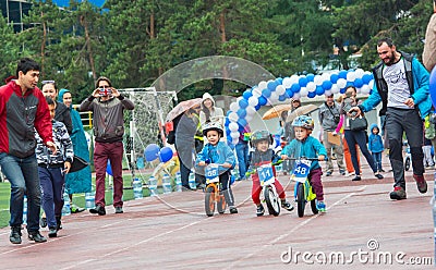 KAZAKHSTAN, ALMATY - JUNE 11, 2017: Children`s cycling competitions Tour de kids. Children aged 2 to 7 years compete in Editorial Stock Photo