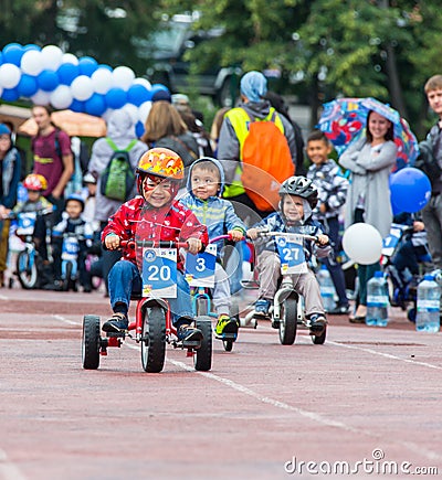 KAZAKHSTAN, ALMATY - JUNE 11, 2017: Children`s cycling competitions Tour de kids. Children aged 2 to 7 years compete in Editorial Stock Photo