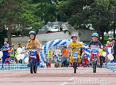 KAZAKHSTAN, ALMATY - JUNE 11, 2017: Children`s cycling competitions Tour de kids. Children aged 2 to 7 years compete in Editorial Stock Photo