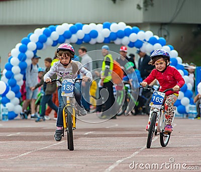 KAZAKHSTAN, ALMATY - JUNE 11, 2017: Children`s cycling competitions Tour de kids. Children aged 2 to 7 years compete in Editorial Stock Photo