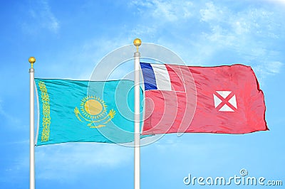 Kazakhstan and Wallis and Futuna two flags on flagpoles and blue sky Stock Photo