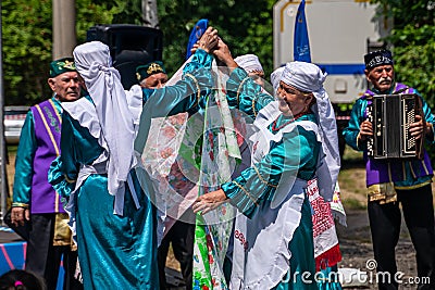 Kazan, Russia, June 26 2021. The Tatar ethnic holiday Sabantuy, end of field works. Traditional Tatar costume with Editorial Stock Photo