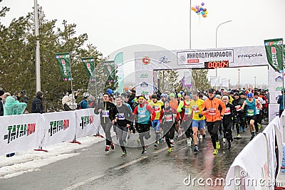 KAZAN, RUSSIA - 23, 2017: marathon runners at start. Kazan M Editorial Stock Photo