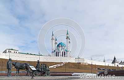 Kazan, Russia - March 28.2017. Monument to benefactor against backdrop of Kazan Kremlin. Russia, Republic of Tatarstan Editorial Stock Photo