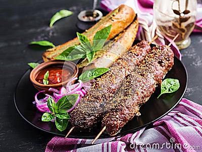 Kebab adana, lamb and beef and toasts Stock Photo
