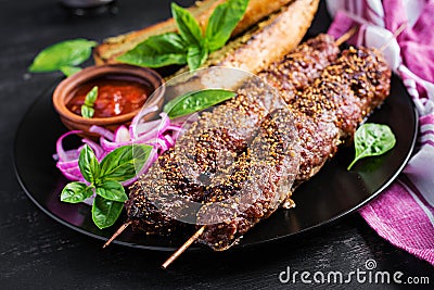 Kebab adana, lamb and beef and toasts Stock Photo