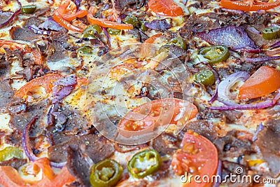 Kebab pizza with tomatoes and onions, close-up. Editorial Stock Photo