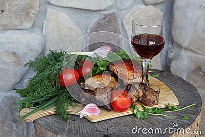 Kebab with vegetables, herbs and red wine Stock Photo