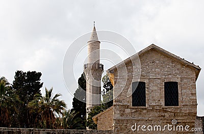 Kebir Mosquealso known as Buyuk mosque minaret in Larnaca, Cyprus and Larnaca Castle Museum Stock Photo