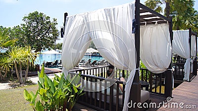 KEDAH, LANGKAWI, MALAYSIA - APR 05th, 2015: Beautiful poolside cabana beside luxury resort Editorial Stock Photo