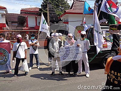 Kediri, East Java Indonesia, 16th July 2020 : Indonesian demonstration on the street. Demonstration about draft bill HIP RUU HIP Editorial Stock Photo