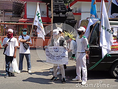 Kediri, East Java Indonesia, 16th July 2020 : Indonesian demonstration on the street. Demonstration about draft bill HIP RUU HIP Editorial Stock Photo