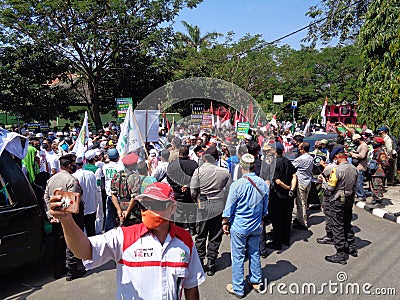 Kediri, East Java Indonesia, 16th July 2020 : Indonesian demonstration on the street. Demonstration about draft bill HIP RUU HIP Editorial Stock Photo