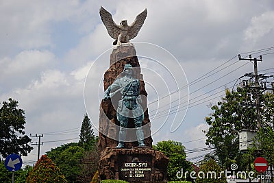 Kediri-Syu PETA monument in Kediri. The statue holding sword and keris Javanese weapon Editorial Stock Photo